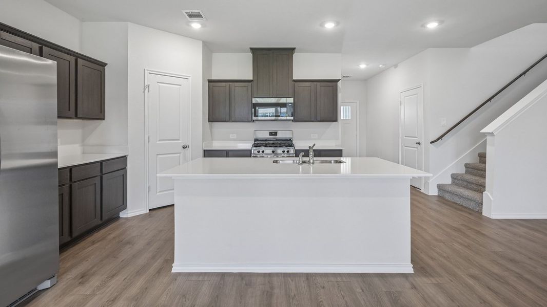 Furnished interior view inside a new home in Windrose, Pilot Point (Image 3).