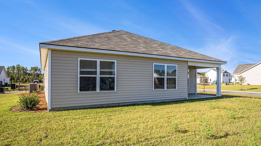 Exterior details and patio area of a home in Stanbury Creek, Supply (Image 4).