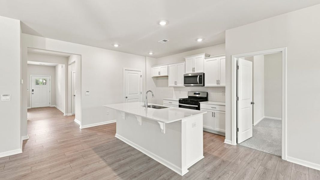 Furnished interior view inside a new home in Durbin Meadows Traditions, Fountain Inn (Image 6).
