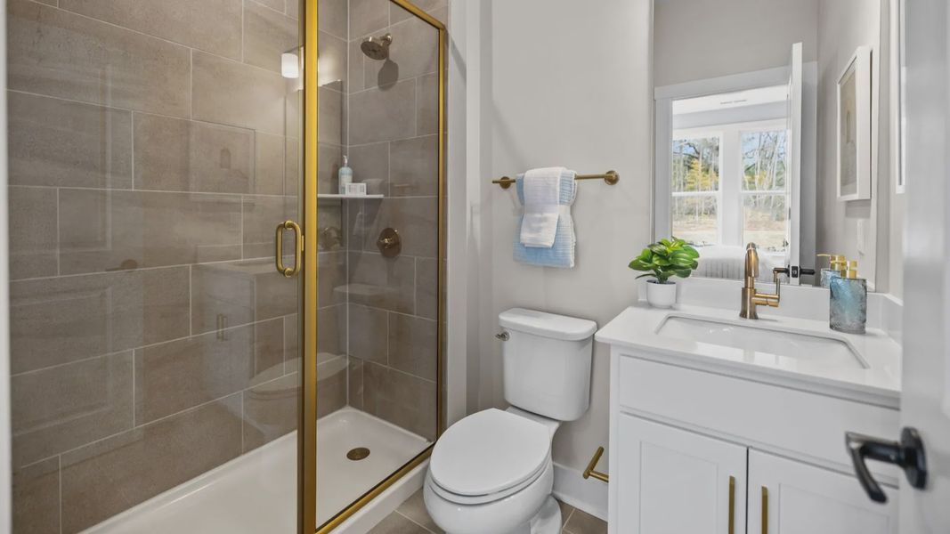 The Stonefield Home Plan in Michaux Garden by DRB Homes in Belmont, NC. - Bathroom