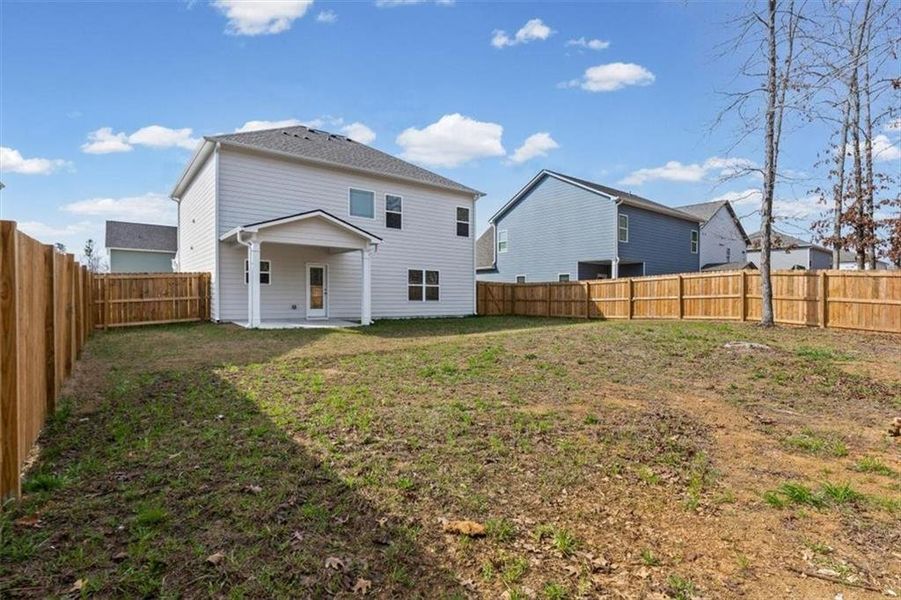 Exterior details and patio area of a home in Emerald Oaks Estates, Rome (Image 28).