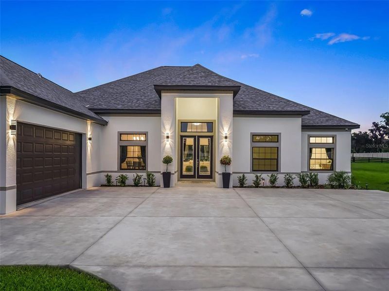 Front exterior of a new home in , Ocala, FL, highlighting curb appeal (Image 34).