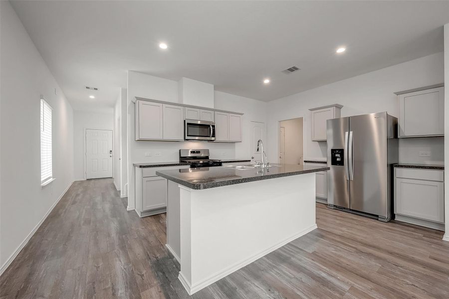 Furnished interior view inside a new home in Breckenridge Forest, Spring (Image 8).