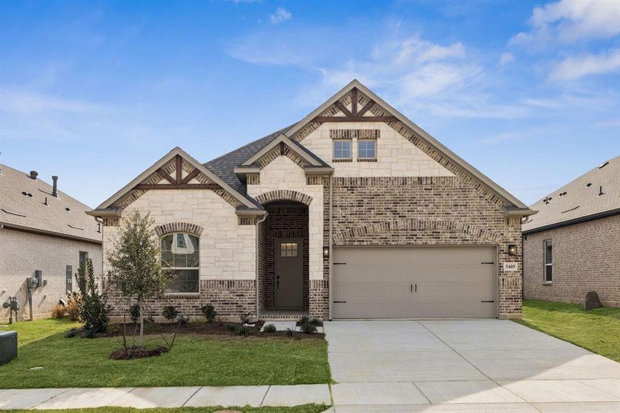 Front exterior of a new home in Country Lakes, Denton, TX, highlighting curb appeal (Image 17).
