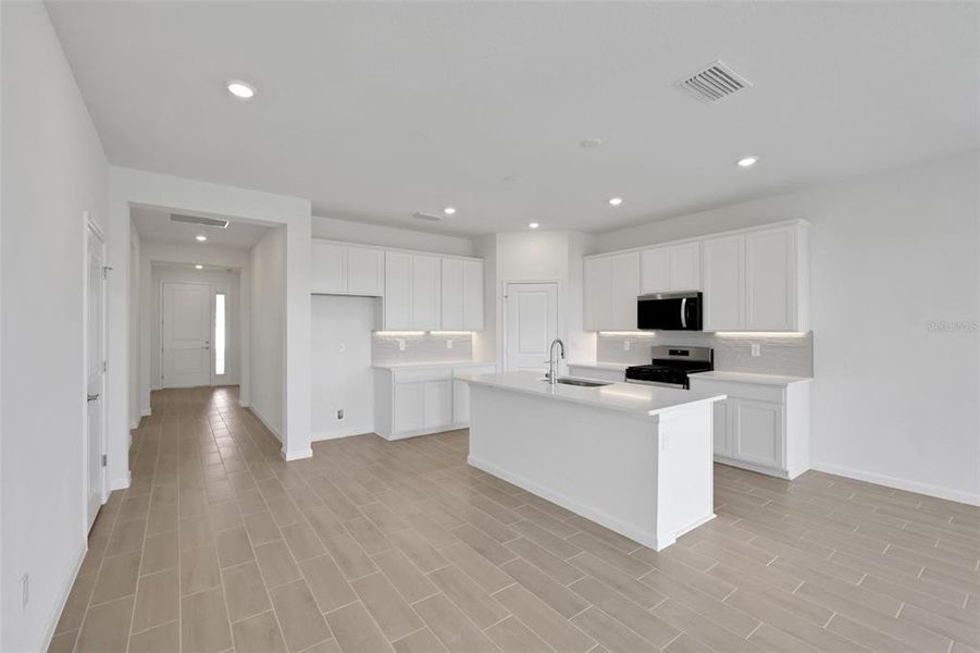 Furnished interior view inside a new home in Brystol North at Wylder, Port St. Lucie (Image 13).