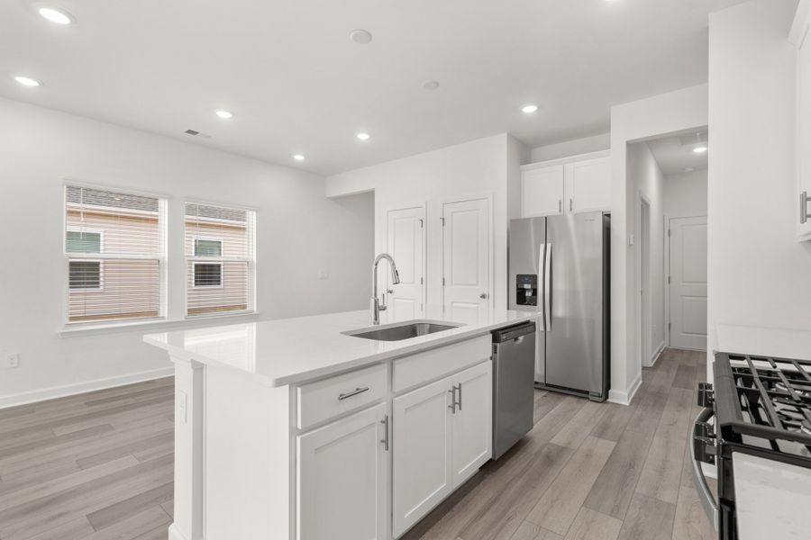 Furnished interior view inside a new home in Cypress Ridge - The Boardwalk Series, Longs (Image 6).
