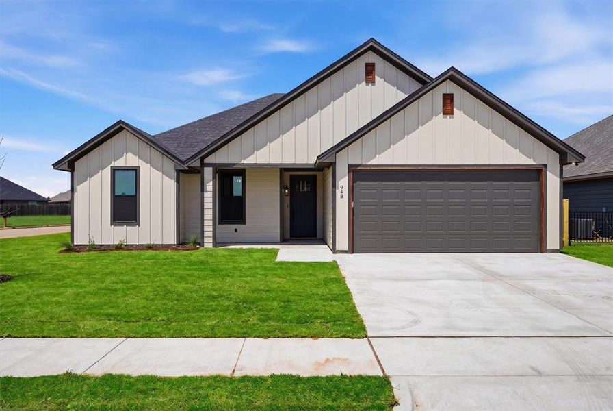 Front exterior of a new home in , Tolar, TX, highlighting curb appeal (Image 2). Front exterior of a new home in , Tolar, TX, highlighting curb appeal (Image 2).