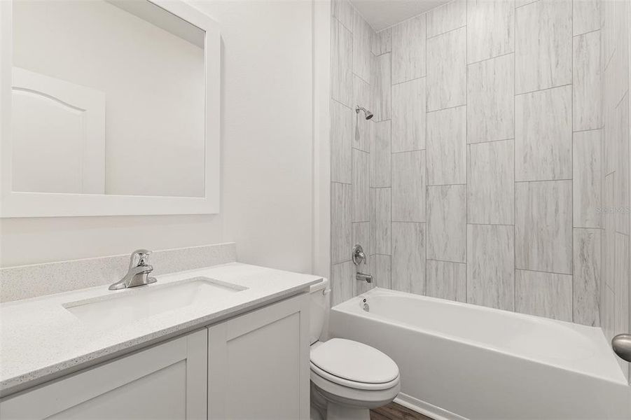 Furnished interior view inside a new home in Peach Crossings, Winter Haven (Image 8). Furnished interior view inside a new home in Peach Crossings, Winter Haven (Image 8).