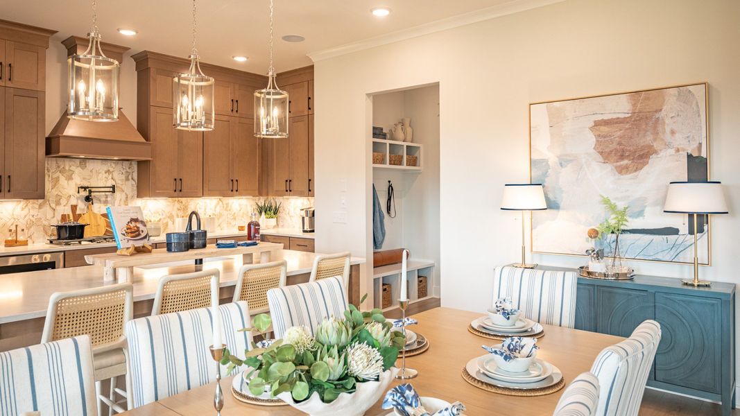 Kitchen and Dining area layout with drop-zone mud room coming from the garage entrance