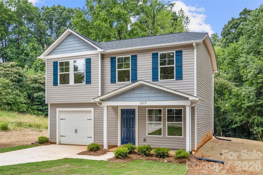 Front exterior of a new home in , Lancaster, SC, highlighting curb appeal (Image 16).