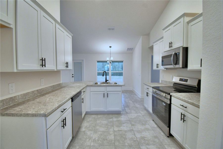 Furnished interior view inside a new home in Cadence Crossing, Auburndale (Image 9).
