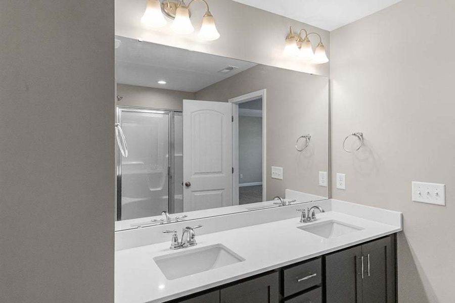 Representative furnished interior of a home built from the Magnolia by Caviness & Cates Communities in Bartlett Manor, Youngsville (Image 56).