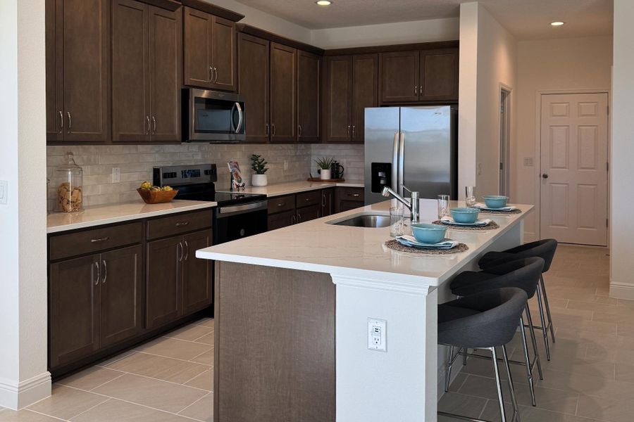 Furnished interior view inside a new home in Ridgeview, Clermont (Image 4).