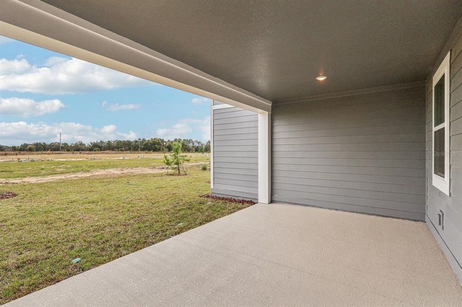 Exterior details and patio area of a home in Trailside, Mount Dora (Image 3).