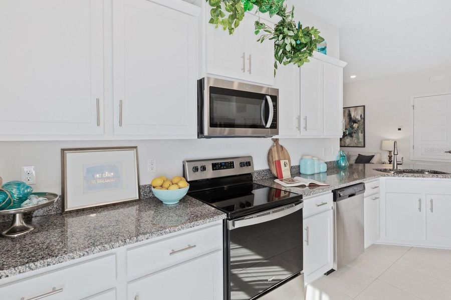 Representative furnished interior of a home built from the 1820 by Adams Homes in Winding Oaks, Weeki Wachee (Image 9).