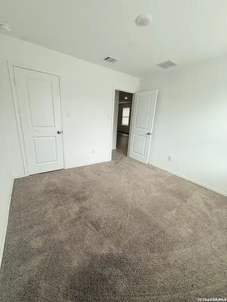 Spacious, unfurnished interior of a new home in Crescent Hills: Stonehill Collection, San Antonio (Image 8).
