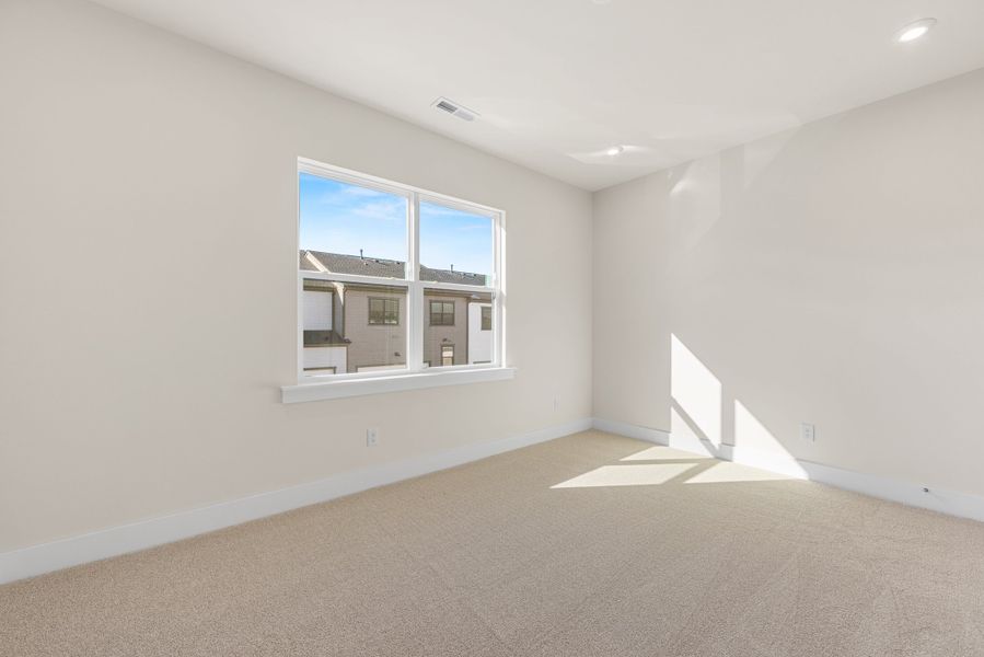 Spacious, unfurnished interior of a new home in Seven Oaks, Belmont (Image 32).