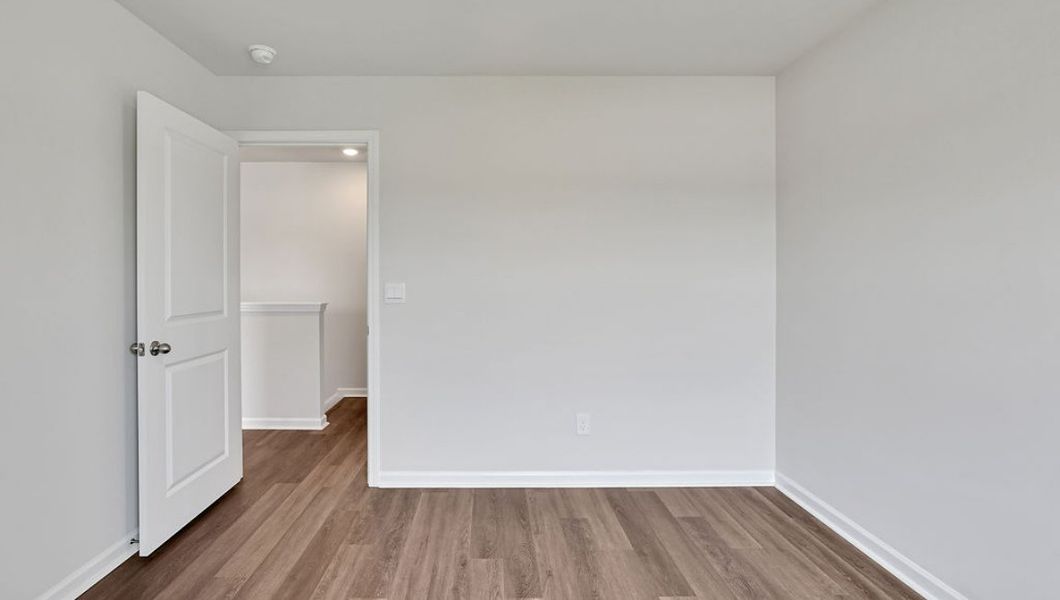 Representative unfurnished interior of a home built from the Hayden by D.R. Horton in Cedar Hill Landing, Navassa (Image 30).