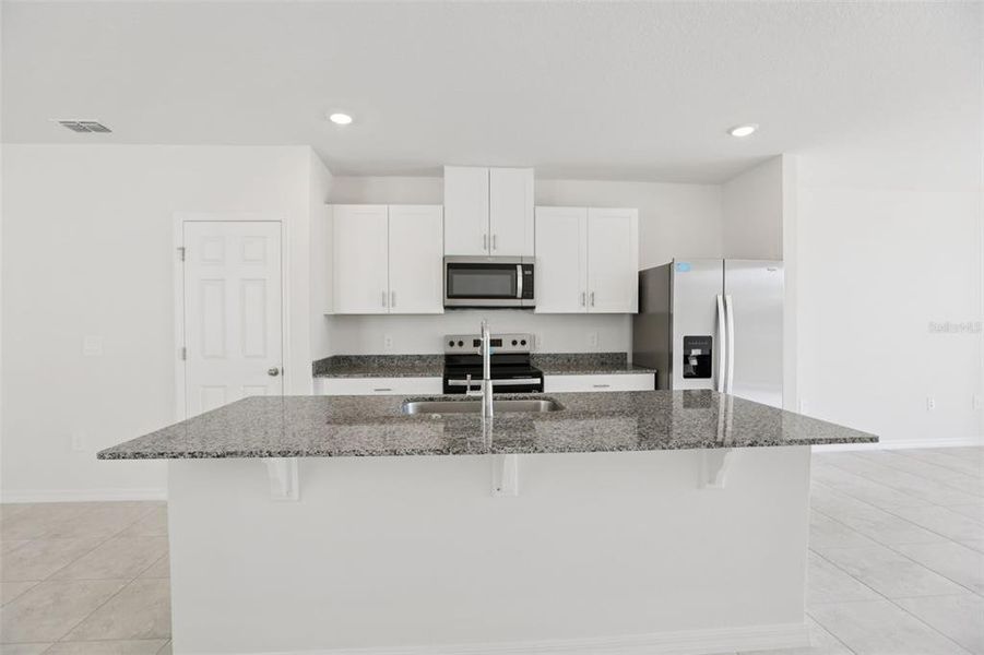 Furnished interior view inside a new home in Springs at Lake Alfred - Classic Series, Lake Alfred (Image 11).