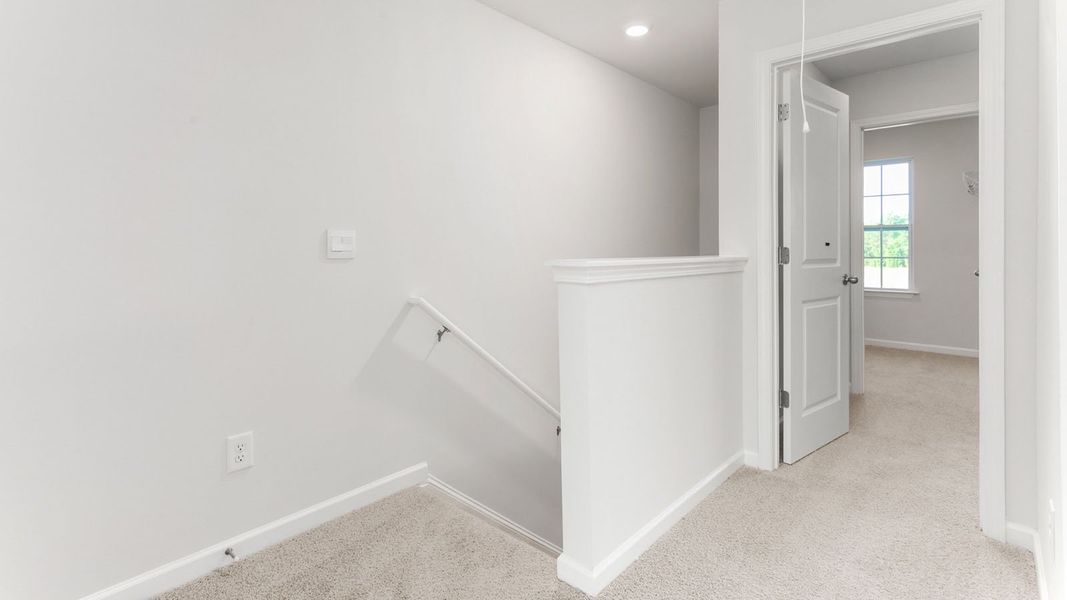 Representative unfurnished interior of a home built from the NEWTON - EXPRESS by D.R. Horton in Glennview, Kernersville (Image 10).