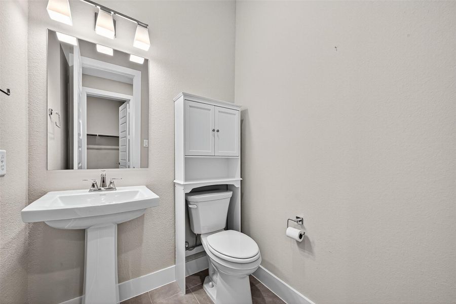 Half bath located downstairs.