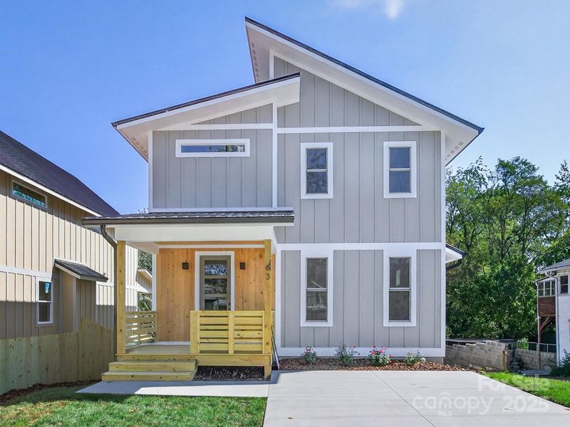 Front exterior of a new home in , Asheville, NC, highlighting curb appeal (Image 1).