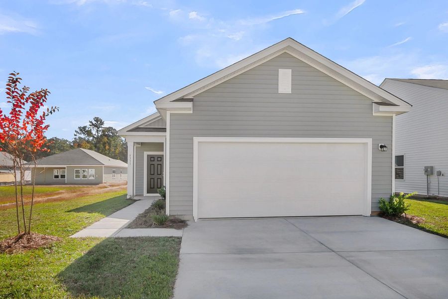 Representative exterior photo of a completed home built from the Atlantis by Starlight Homes in Watson Hill, Summerville, SC (Image 12).