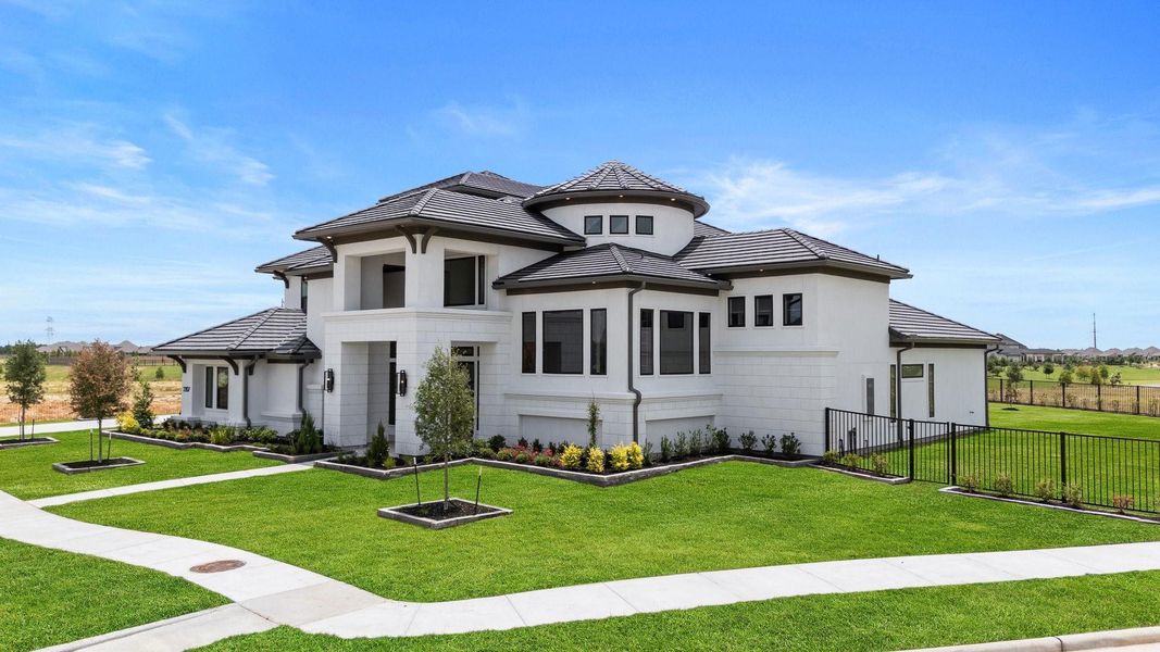 Front exterior of a new home in Bridgeland 45', 50', 70', Cypress, TX, highlighting curb appeal (Image 23). Front exterior of a new home in Bridgeland 45', 50', 70', Cypress, TX, highlighting curb appeal (Image 23).