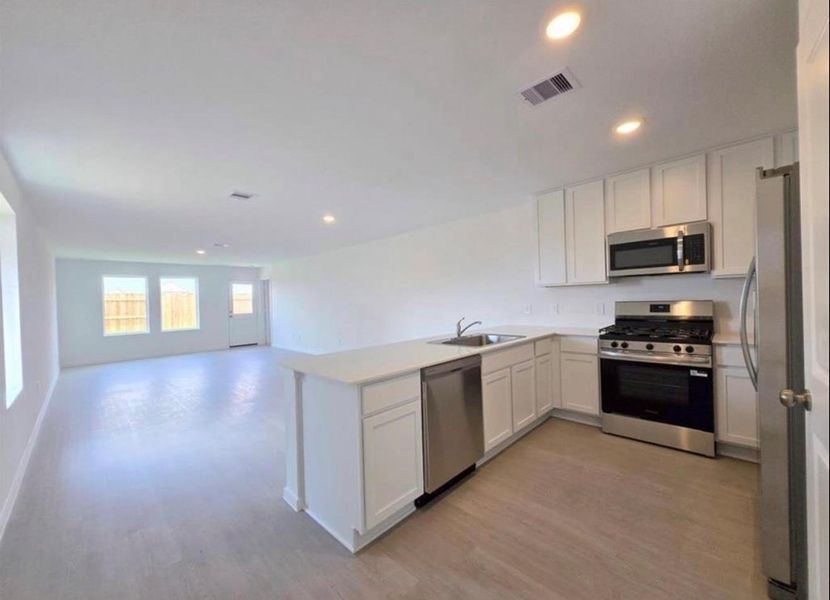 Furnished interior view inside a new home in The Grand Prairie: Cottage Collection, Hockley (Image 7).