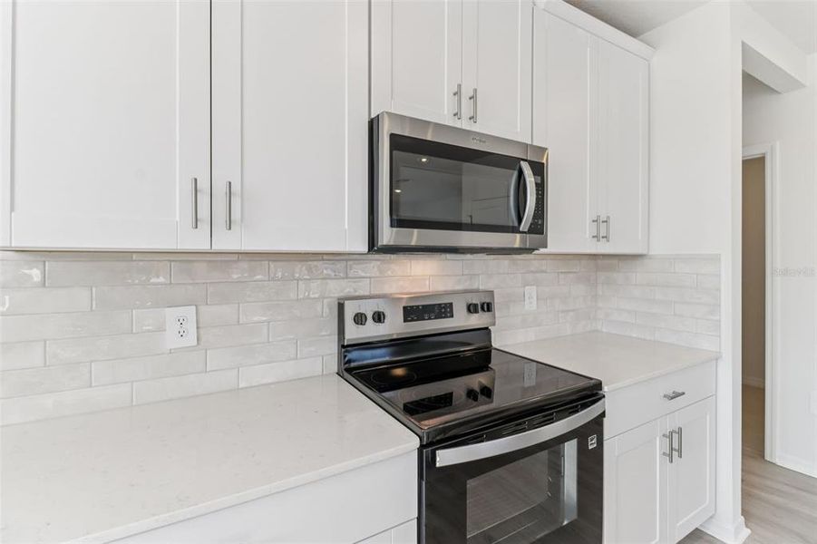 Furnished interior view inside a new home in The Reserve at Hammock Oaks Townes, Lady Lake (Image 10).