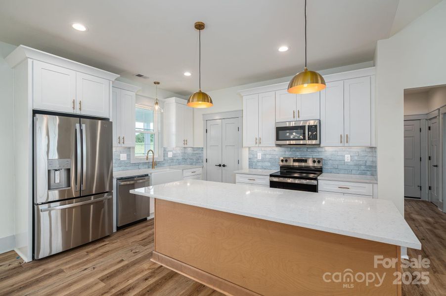Furnished interior view inside a new home in , Vale (Image 5).