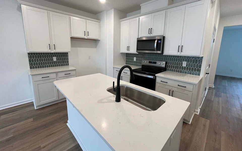 Furnished interior view inside a new home in Townhomes at Wendell Falls, Wendell (Image 5).