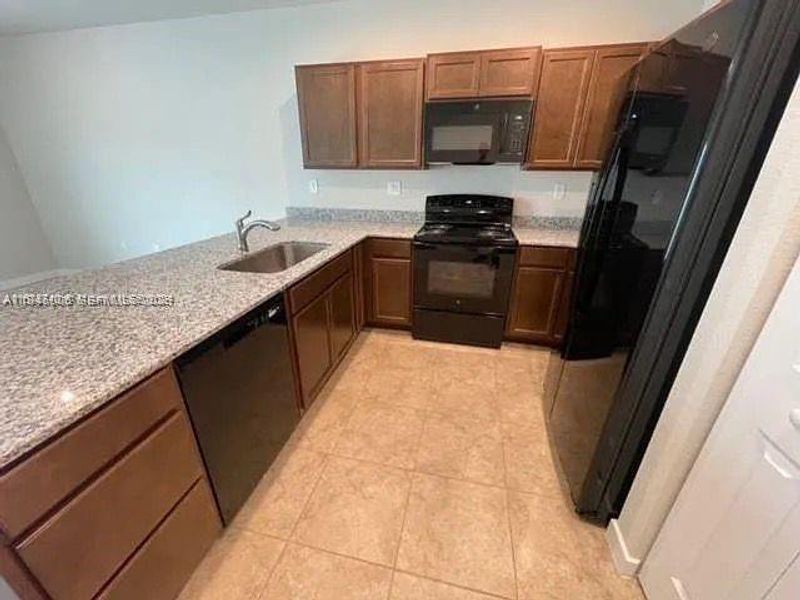 Furnished interior view inside a new home in , Florida City (Image 5).