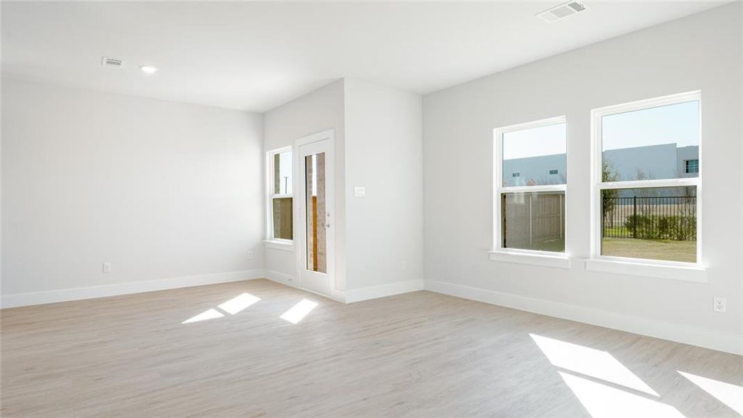 Empty room featuring light hardwood / wood-style floors