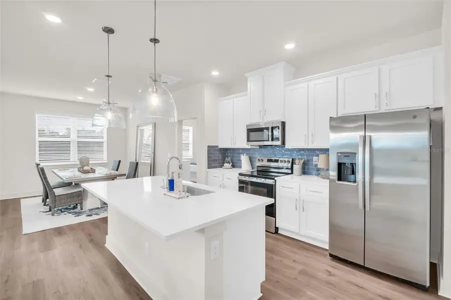 Furnished interior view inside a new home in Arbor Meadows, Spring Hill (Image 4). Furnished interior view inside a new home in Arbor Meadows, Spring Hill (Image 4).