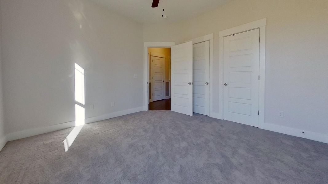 Representative unfurnished interior of a home built from the Addington by Enchanted Homes in Davis Heights, Inman (Image 21).