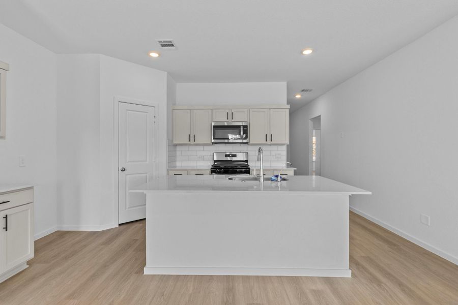 Furnished interior view inside a new home in Harrington Trails at The Canopies, Splendora (Image 10).