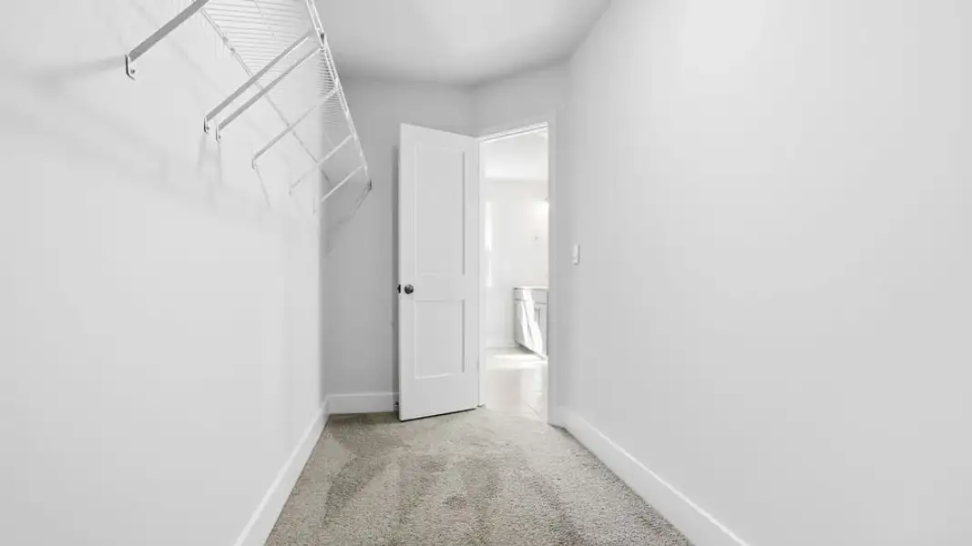 Representative unfurnished interior of a home built from the Lansing by D.R. Horton in Ashmore Hills, Mauldin (Image 32).