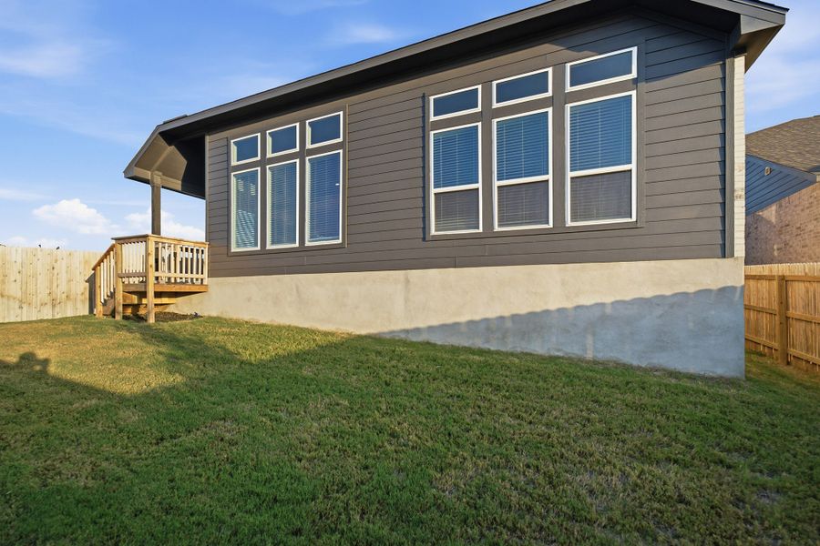 Exterior details and patio area of a home in The Woodlands at Medina Hills, Mico (Image 4).