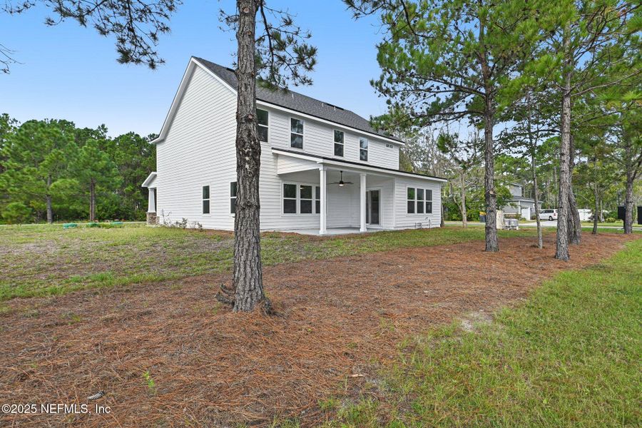 Exterior details and patio area of a home in , Fernandina Beach (Image 32).
