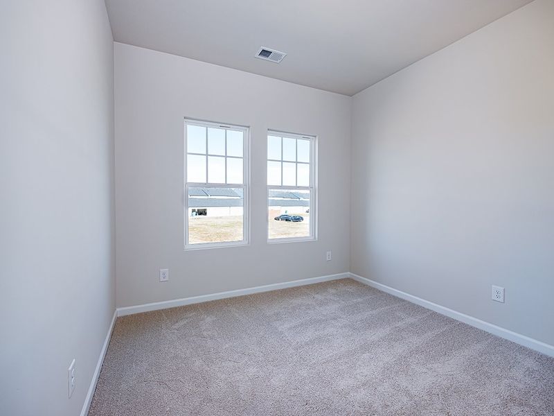 Representative unfurnished interior of a home built from the Watkins by Brookline Homes in The Crossing at Cramerton Mills, Gastonia (Image 17).