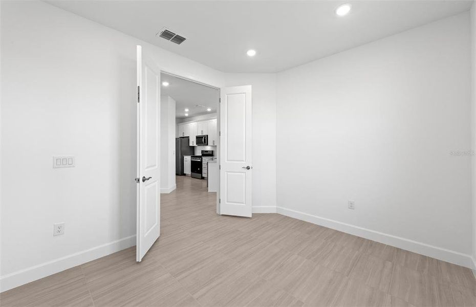 Spacious, unfurnished interior of a new home in BeachWalk by Manasota Key, Englewood (Image 15). Spacious, unfurnished interior of a new home in BeachWalk by Manasota Key, Englewood (Image 15).