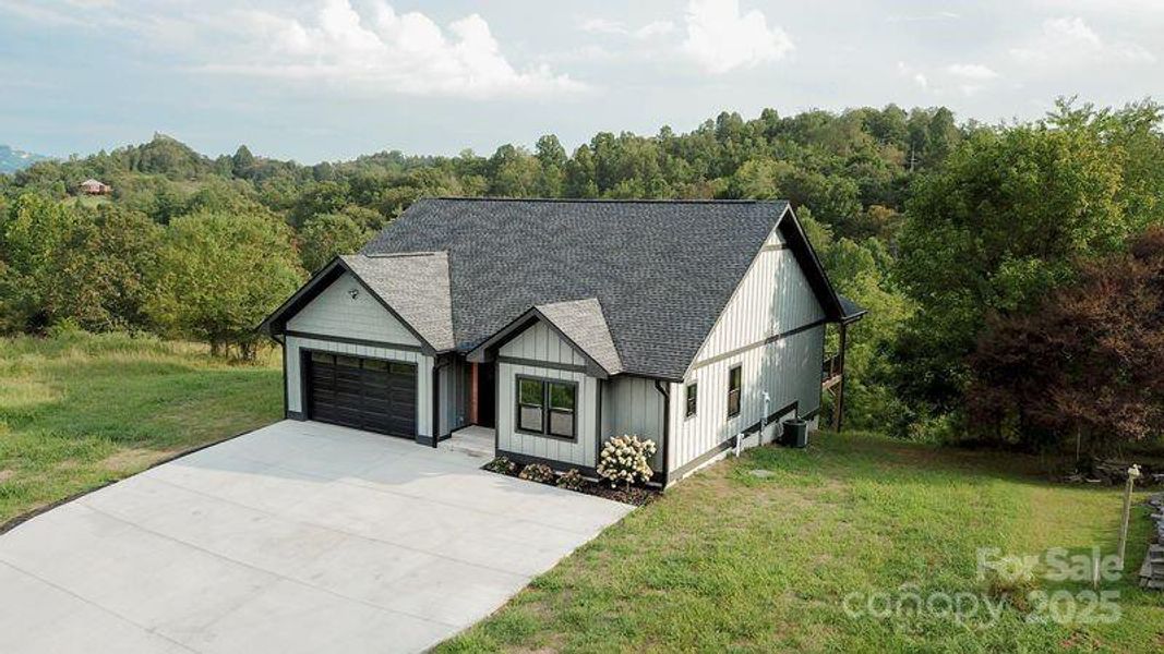 Front exterior of a new home in , Alexander, NC, highlighting curb appeal (Image 28). Front exterior of a new home in , Alexander, NC, highlighting curb appeal (Image 28).