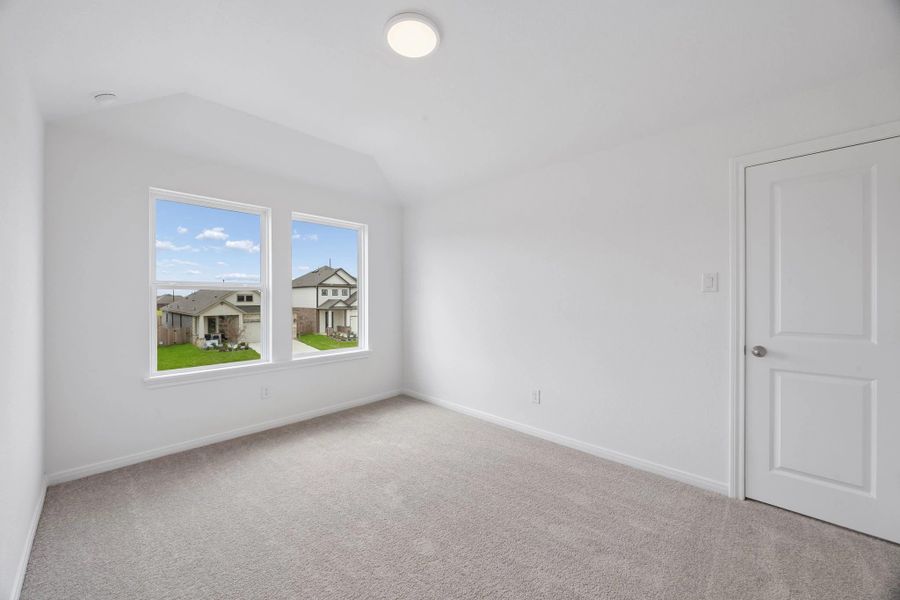 Secondary bedroom. Sample product photo. Actual exterior and interior selections may vary by homesite. Photo may be virtually staged.