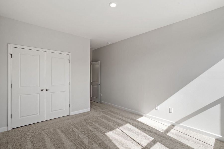 Spacious, unfurnished interior of a new home in Ovation at Sweetbrier, Durham (Image 29).