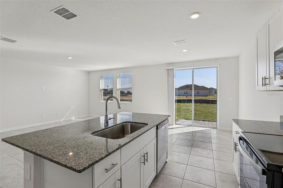 Furnished interior view inside a new home in Crosswinds - Signature Series, Haines City (Image 7).
