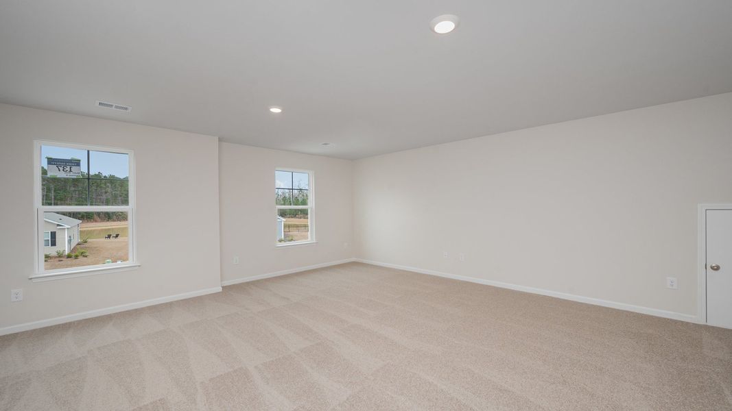 Spacious, unfurnished interior of a new home in Indigo Preserve, Leland (Image 20).