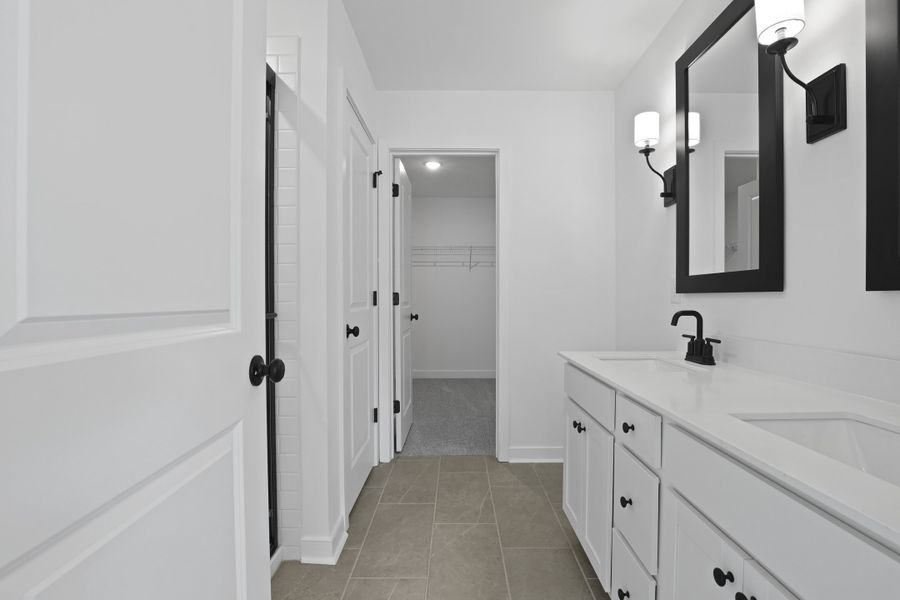 Primary bath with matte black finishes