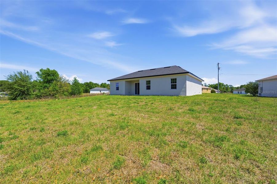 Exterior details and patio area of a home in , Ocala (Image 23).