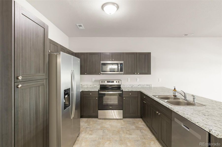 Furnished interior view inside a new home in , Colorado Springs (Image 7).